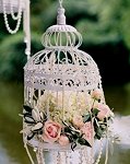 Decorative Birdcage with flowers & strings of pearls for vintage look