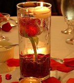 Glass Cylinders with Glass Gem Stones, Floating Disc Candles and long stem rose